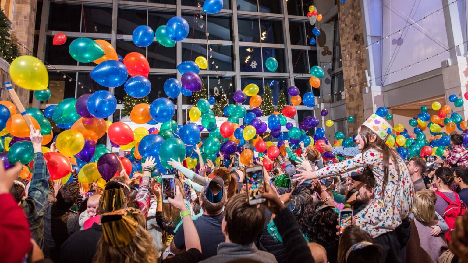 Family New Years celebration event with balloons